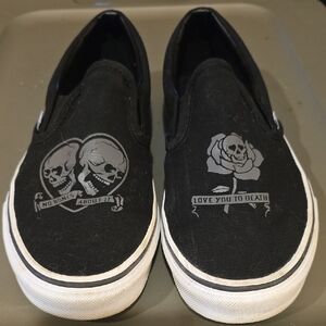 Vans Black Slip-On Sneakers with Grey Skull Graphics